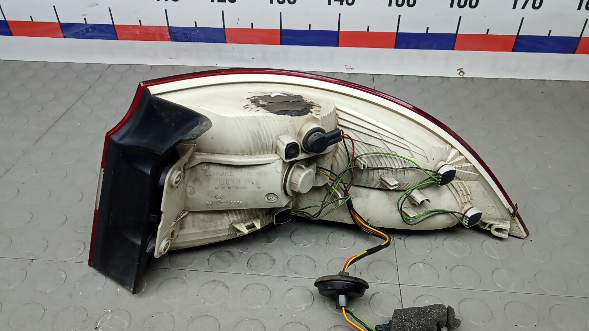 Фонарь задний левый