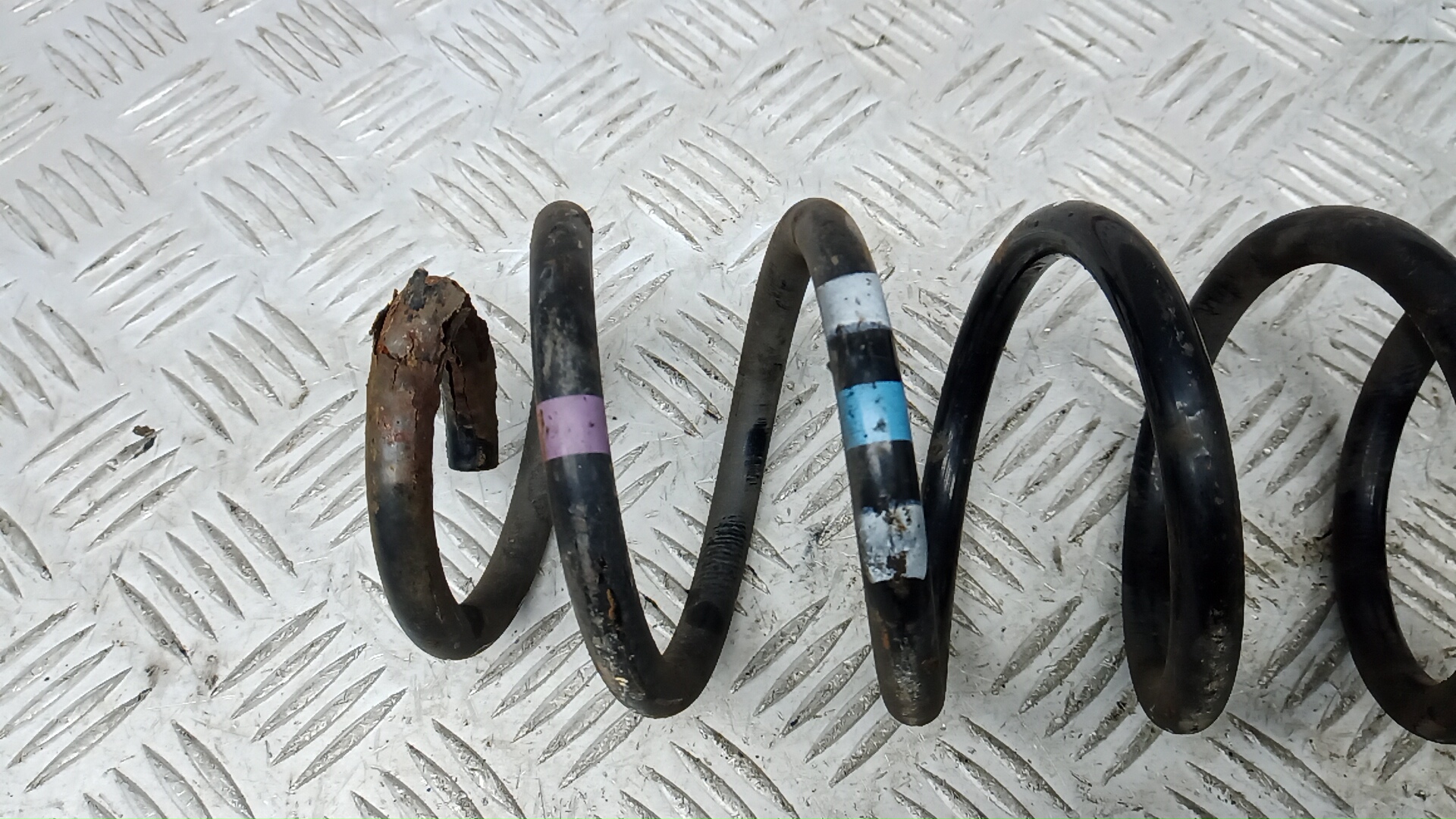 Пружина задняя