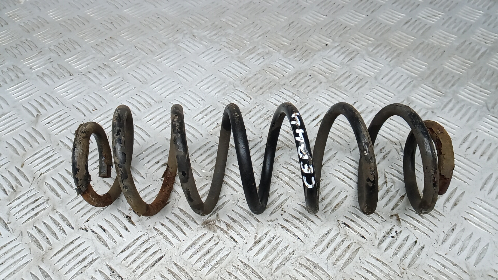 Пружина задняя