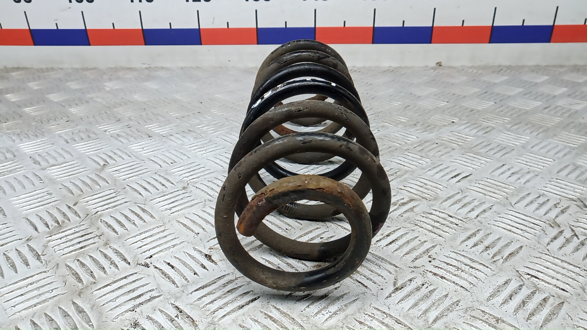 Пружина задняя