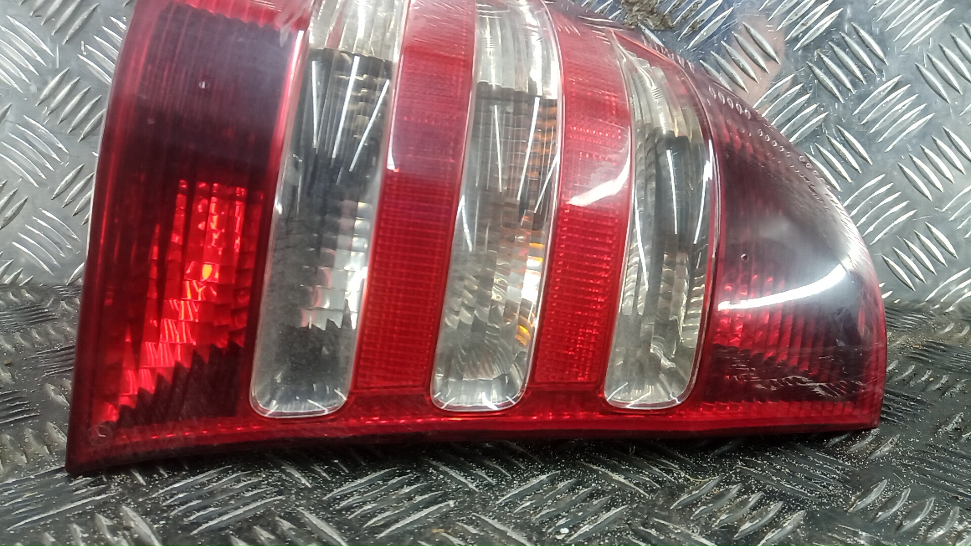 Фонарь задний левый