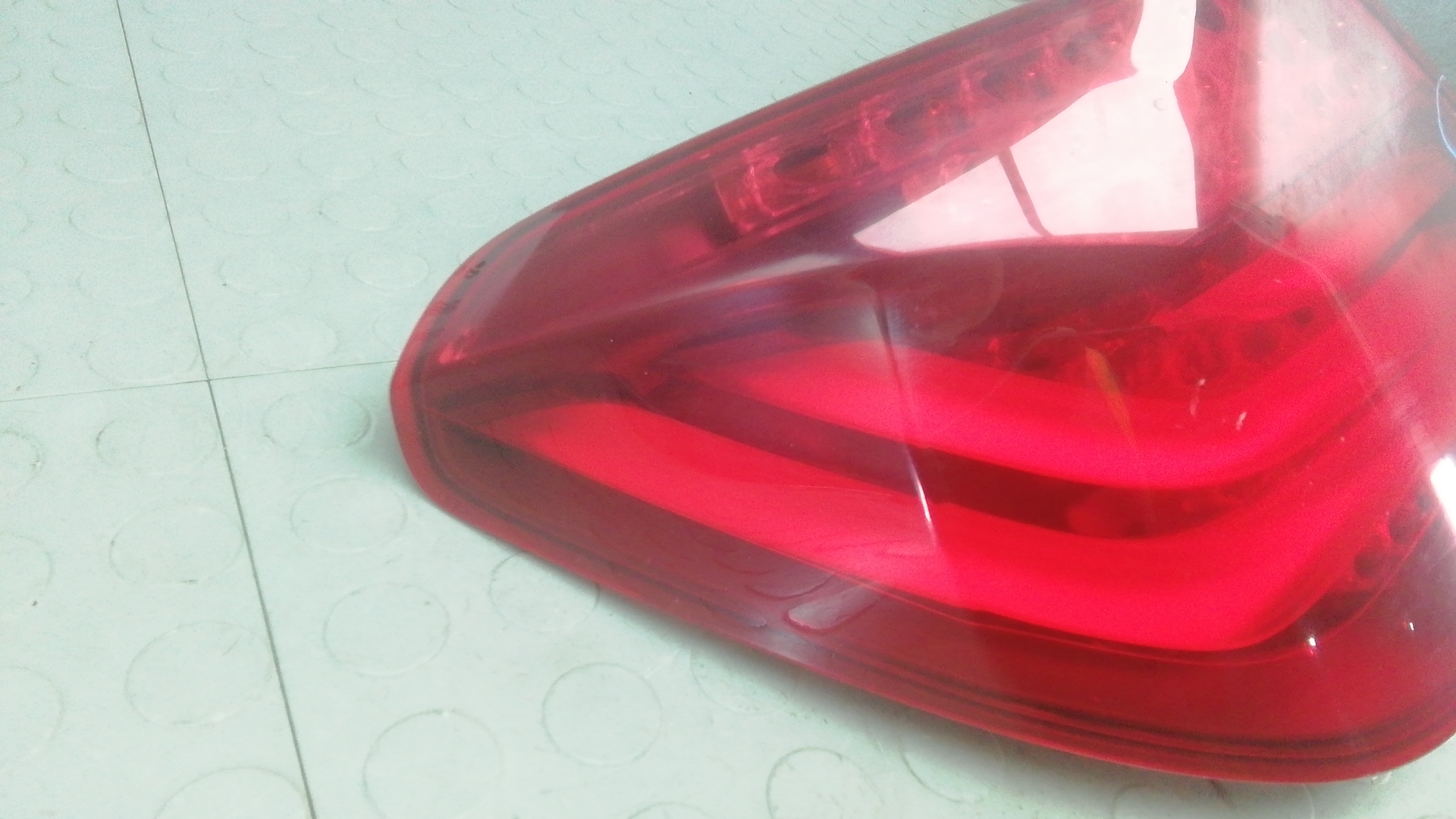 Фонарь задний левый