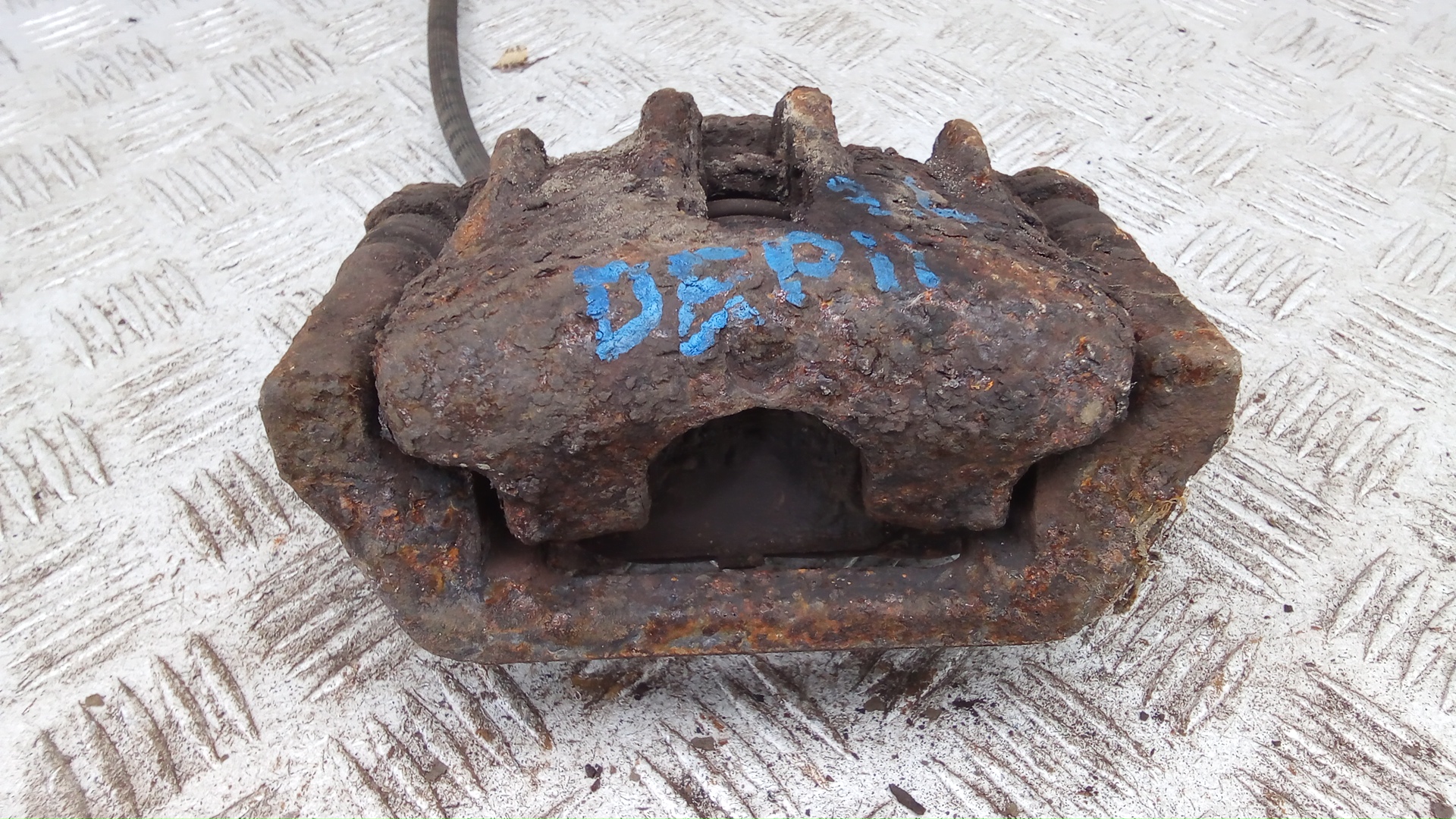 Суппорт задний левый