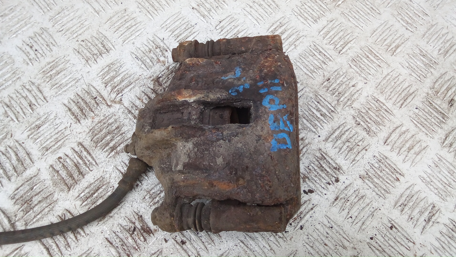 Суппорт задний левый