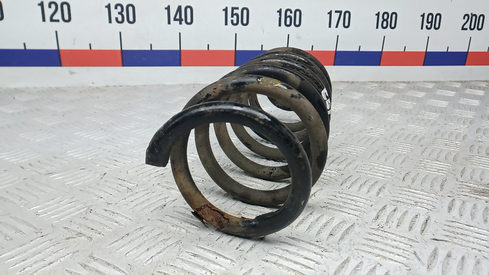 Пружина задняя