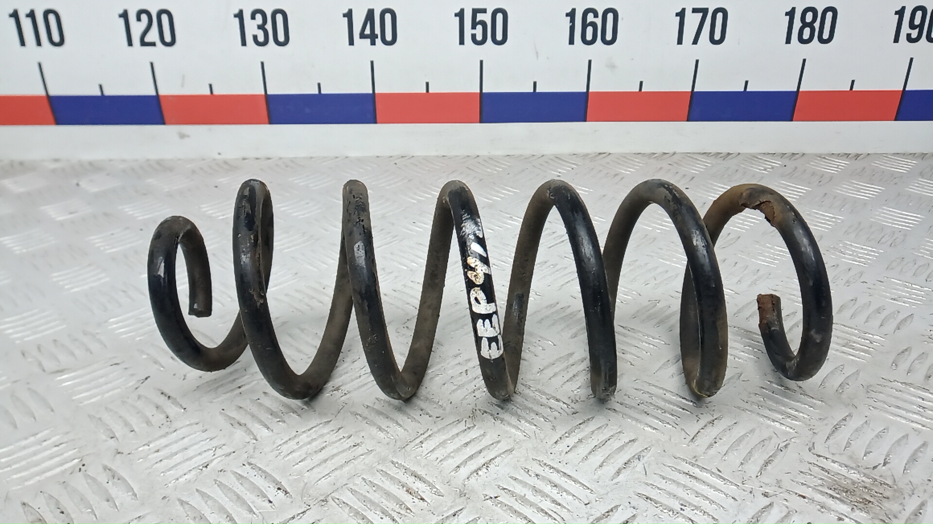 Пружина задняя