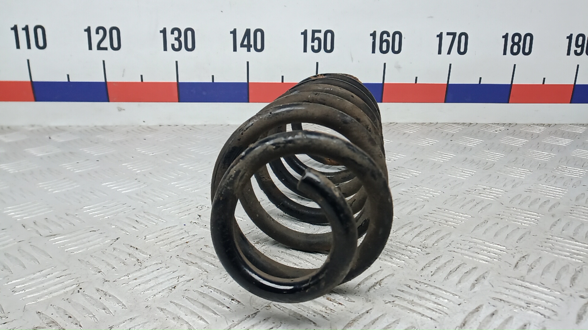 Пружина задняя