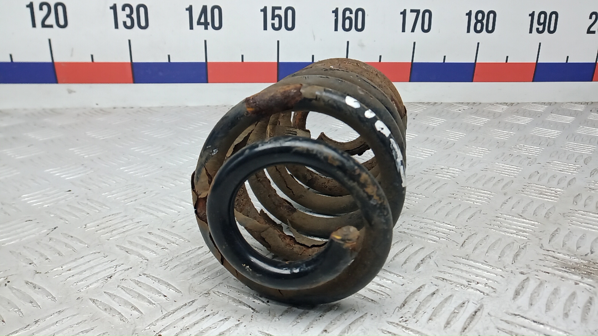 Пружина задняя