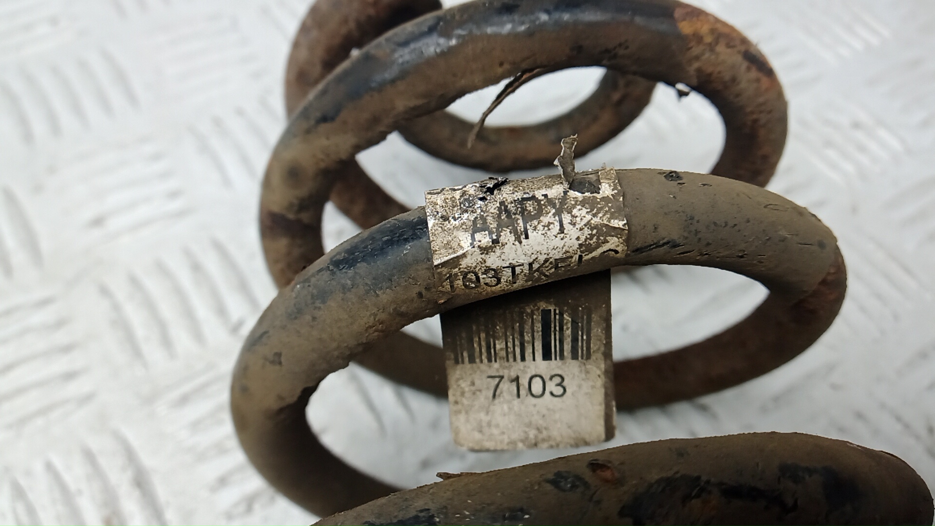 Пружина задняя