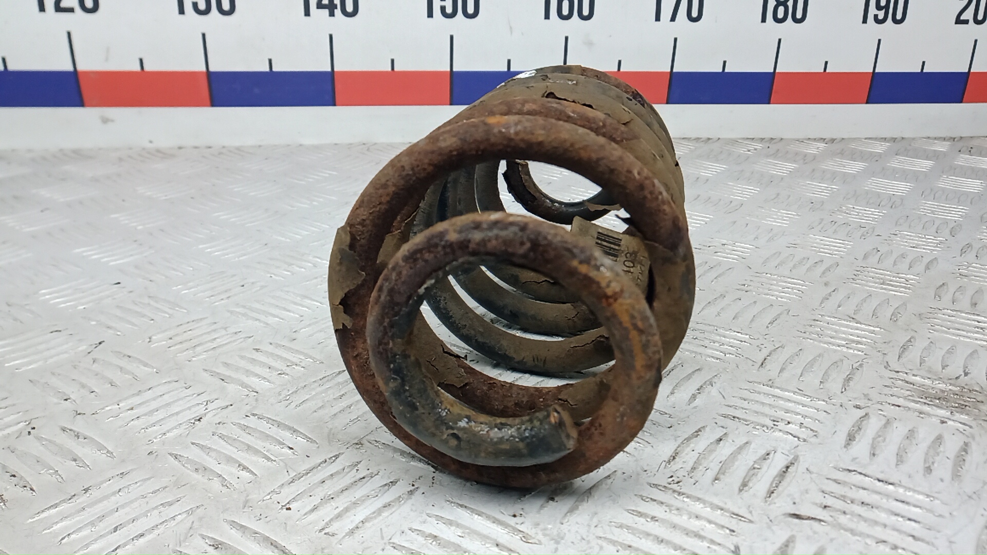 Пружина задняя