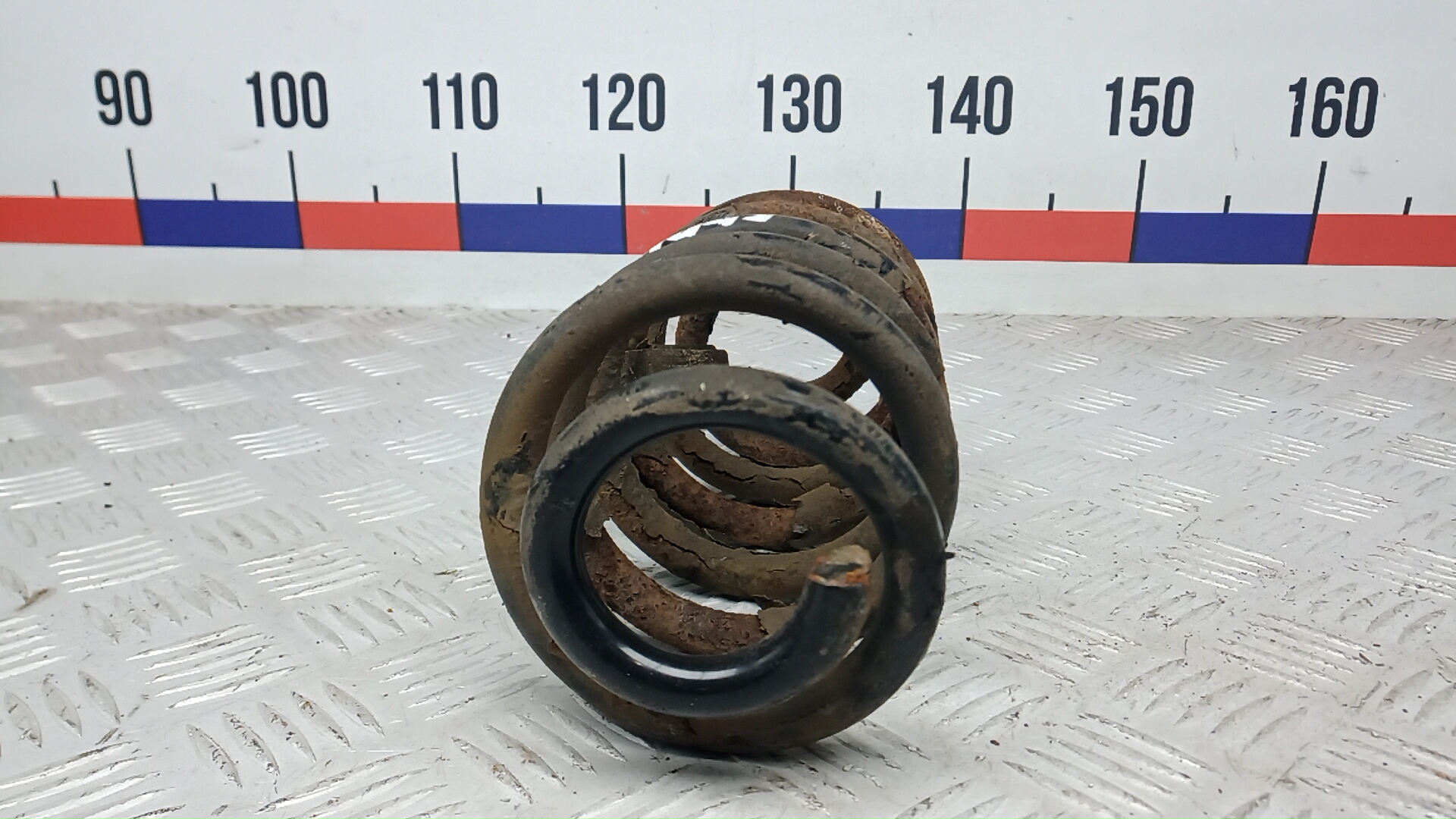 Пружина задняя