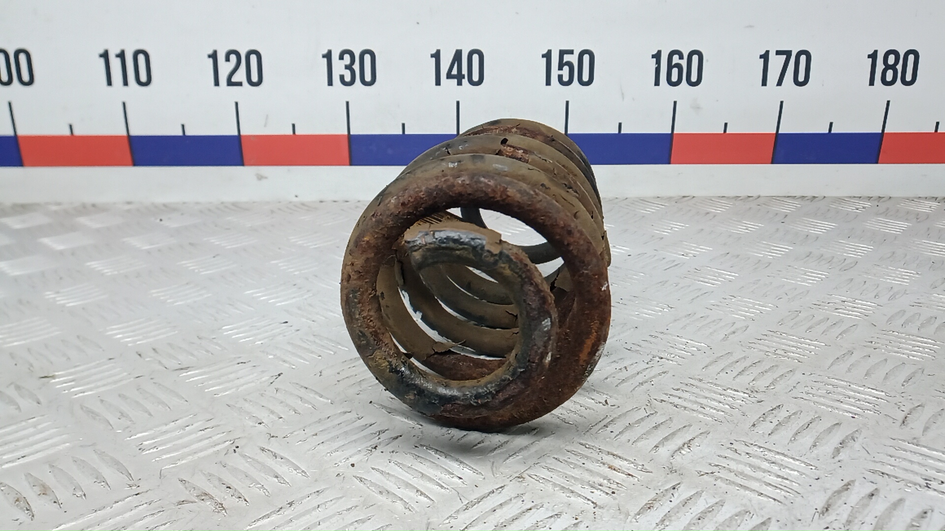 Пружина задняя