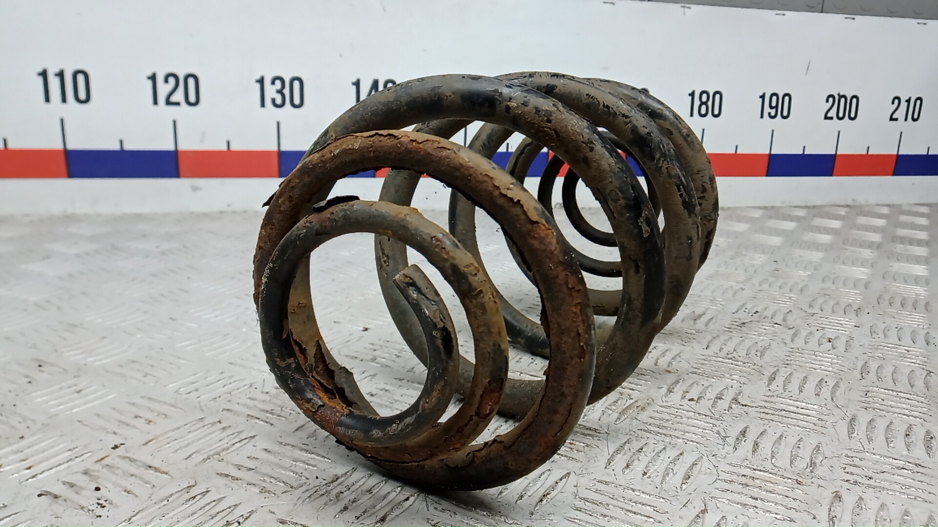 Пружина задняя