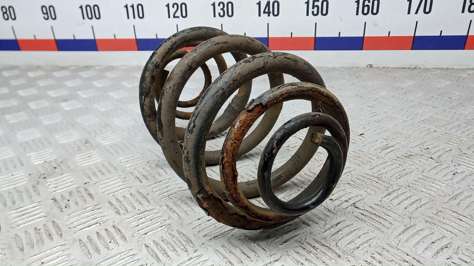 Пружина задняя