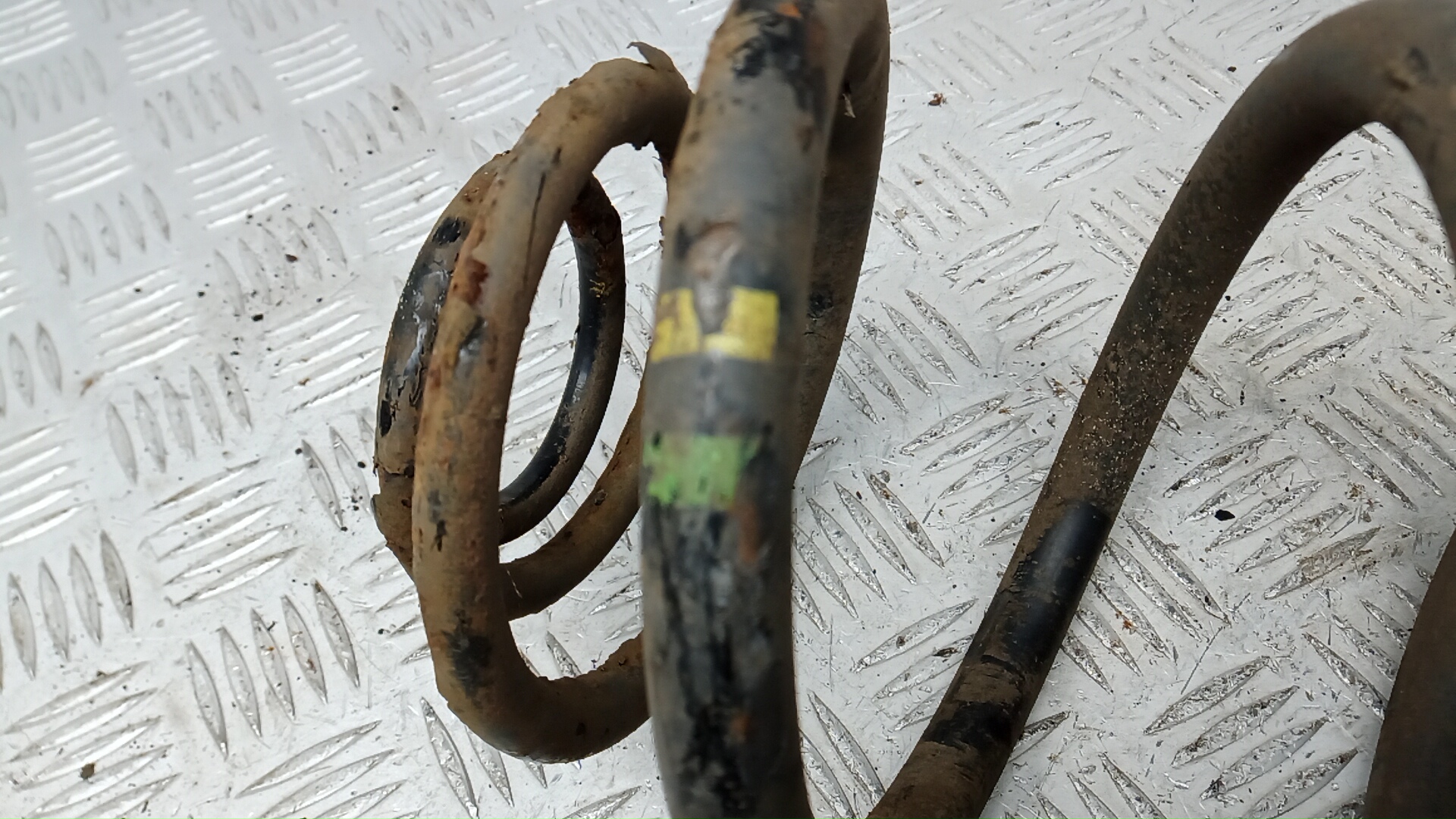 Пружина задняя