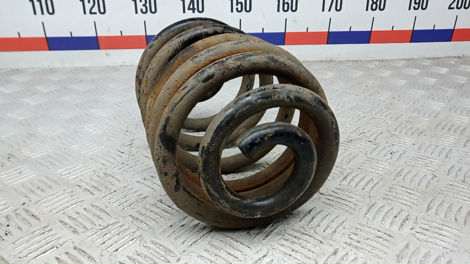 Пружина задняя