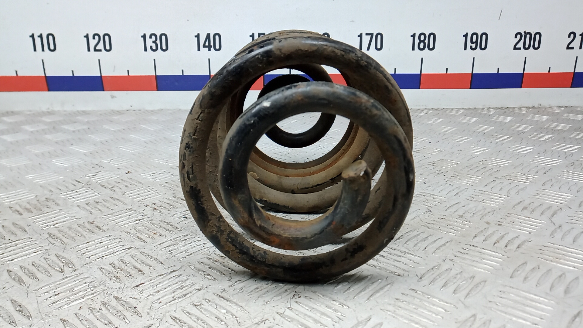 Пружина задняя