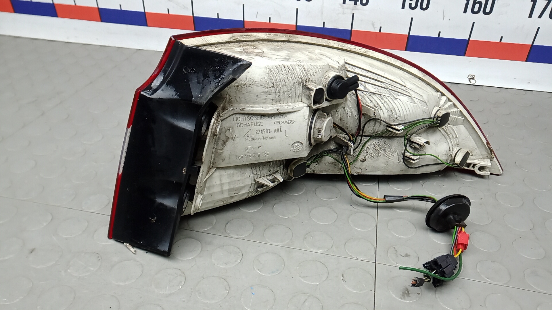 Фонарь задний левый