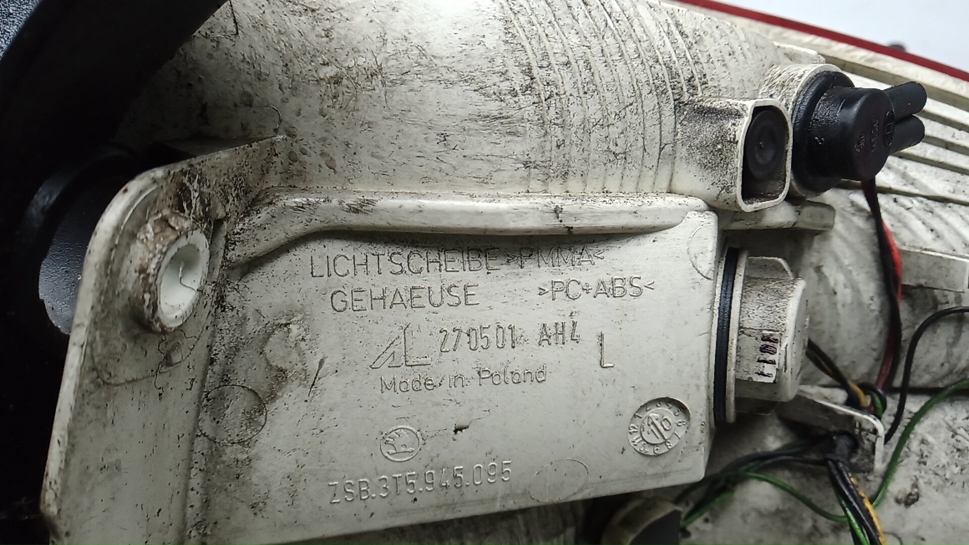 Фонарь задний левый