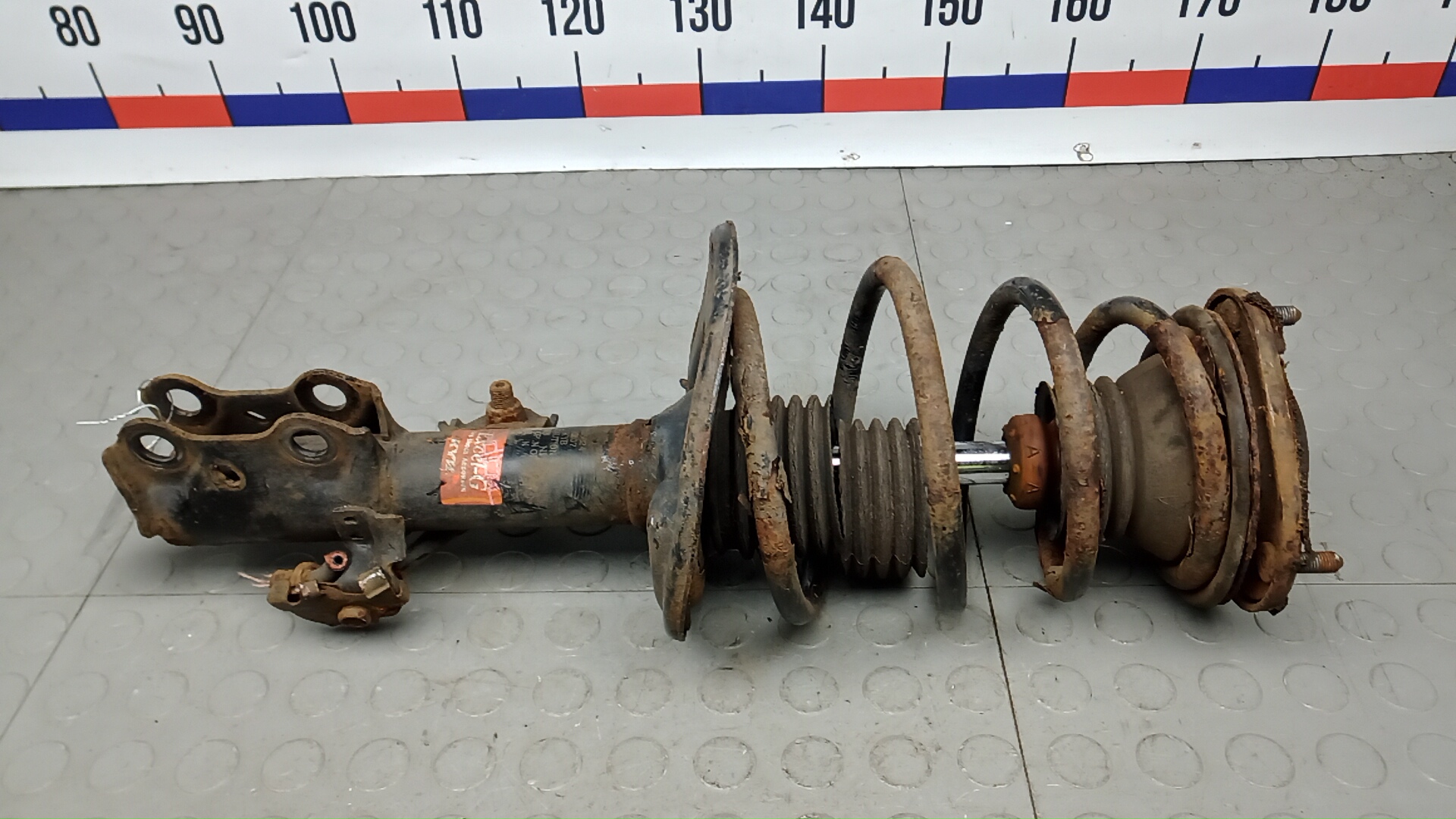 Амортизатор передний левый