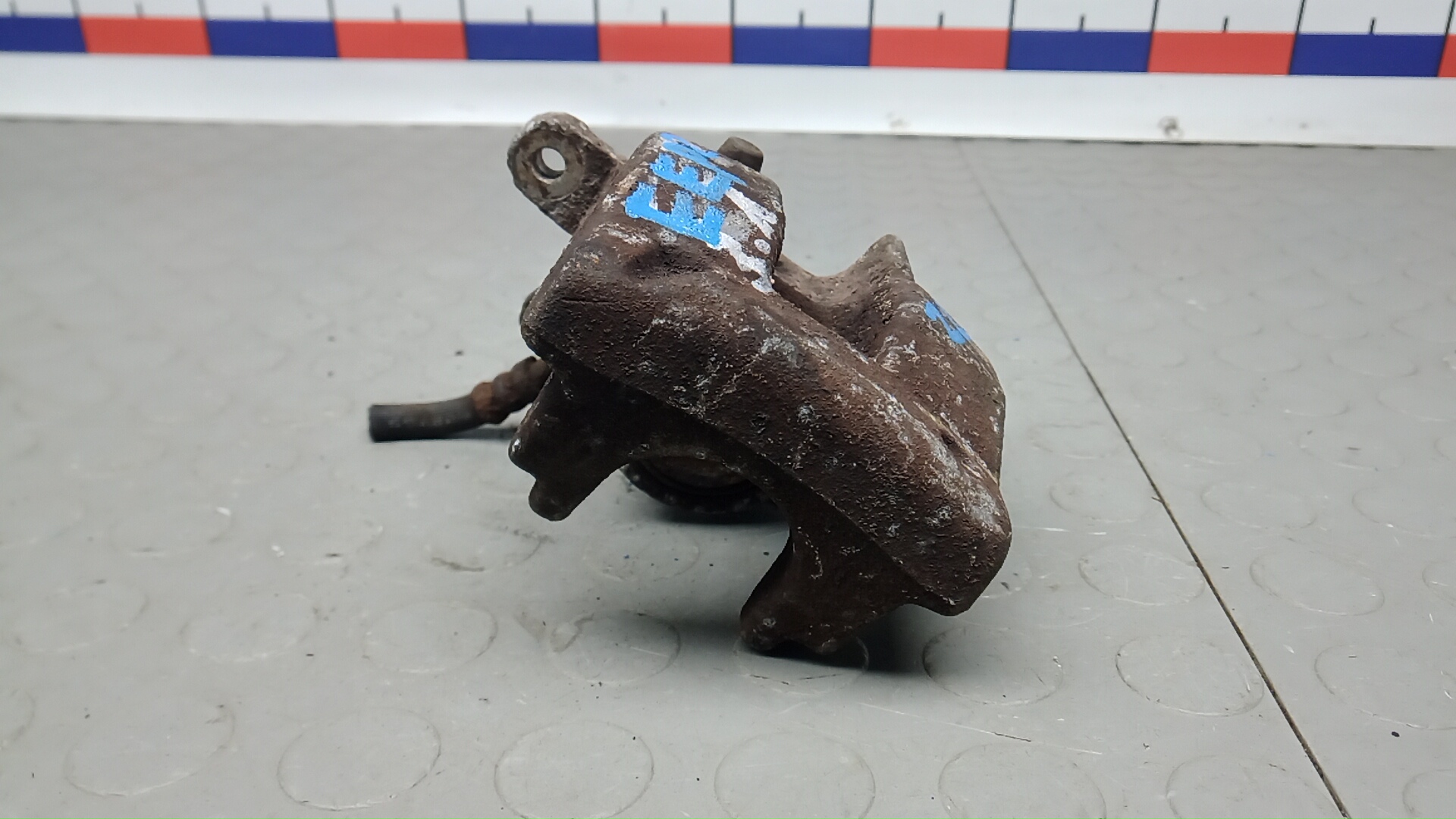 Суппорт задний левый