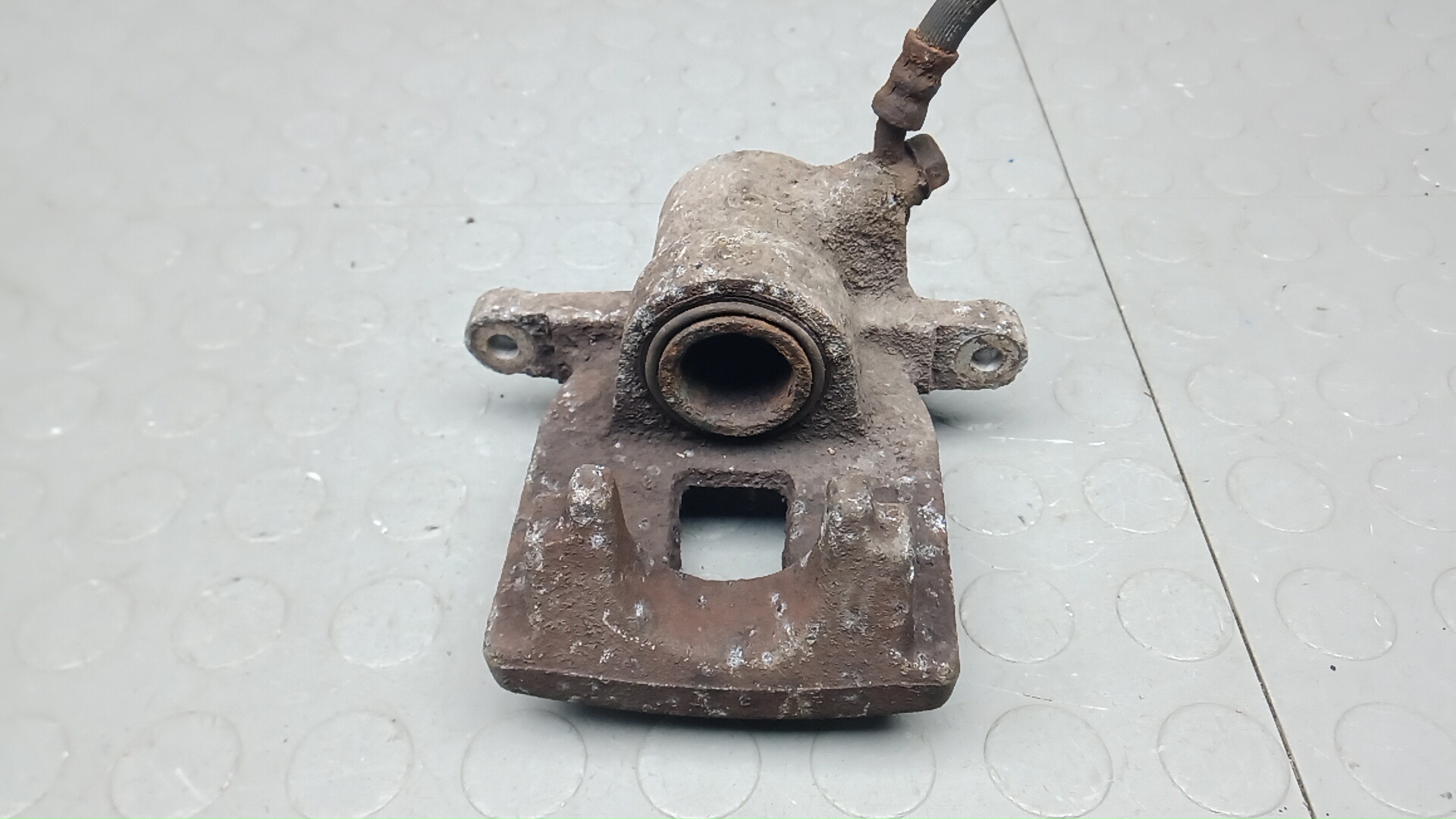 Суппорт задний левый