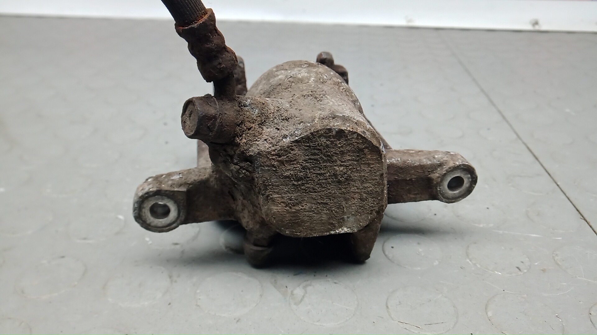 Суппорт задний левый