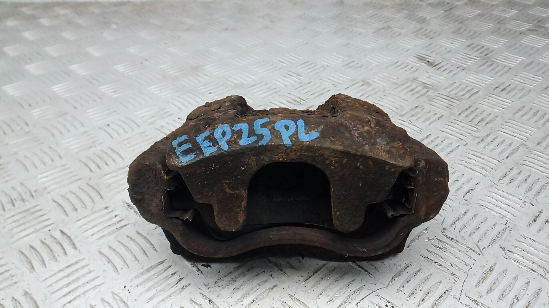 Суппорт передний левый