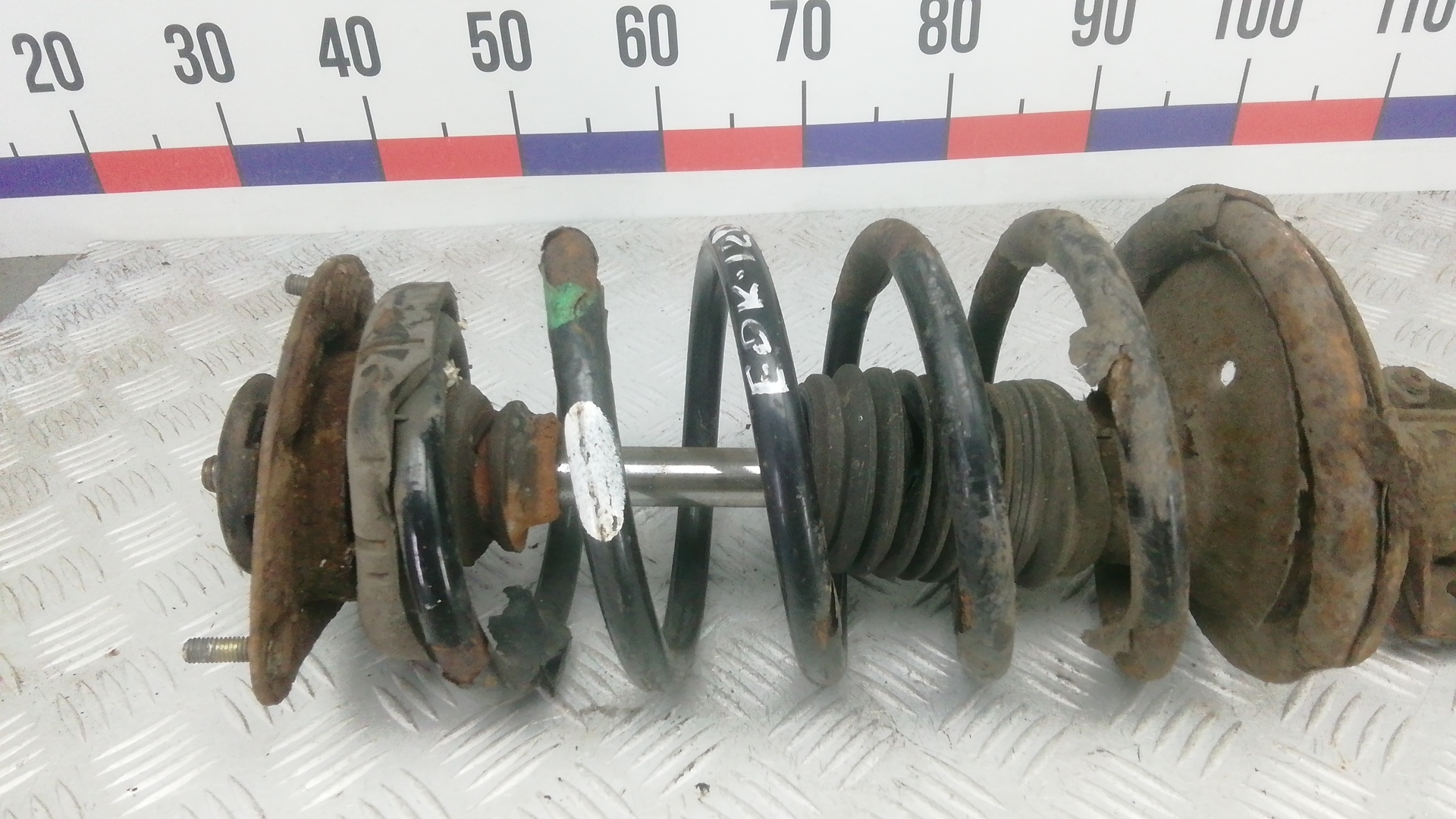 Амортизатор передний левый