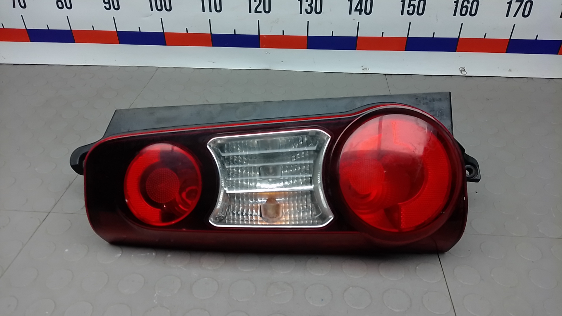 Фонарь задний левый