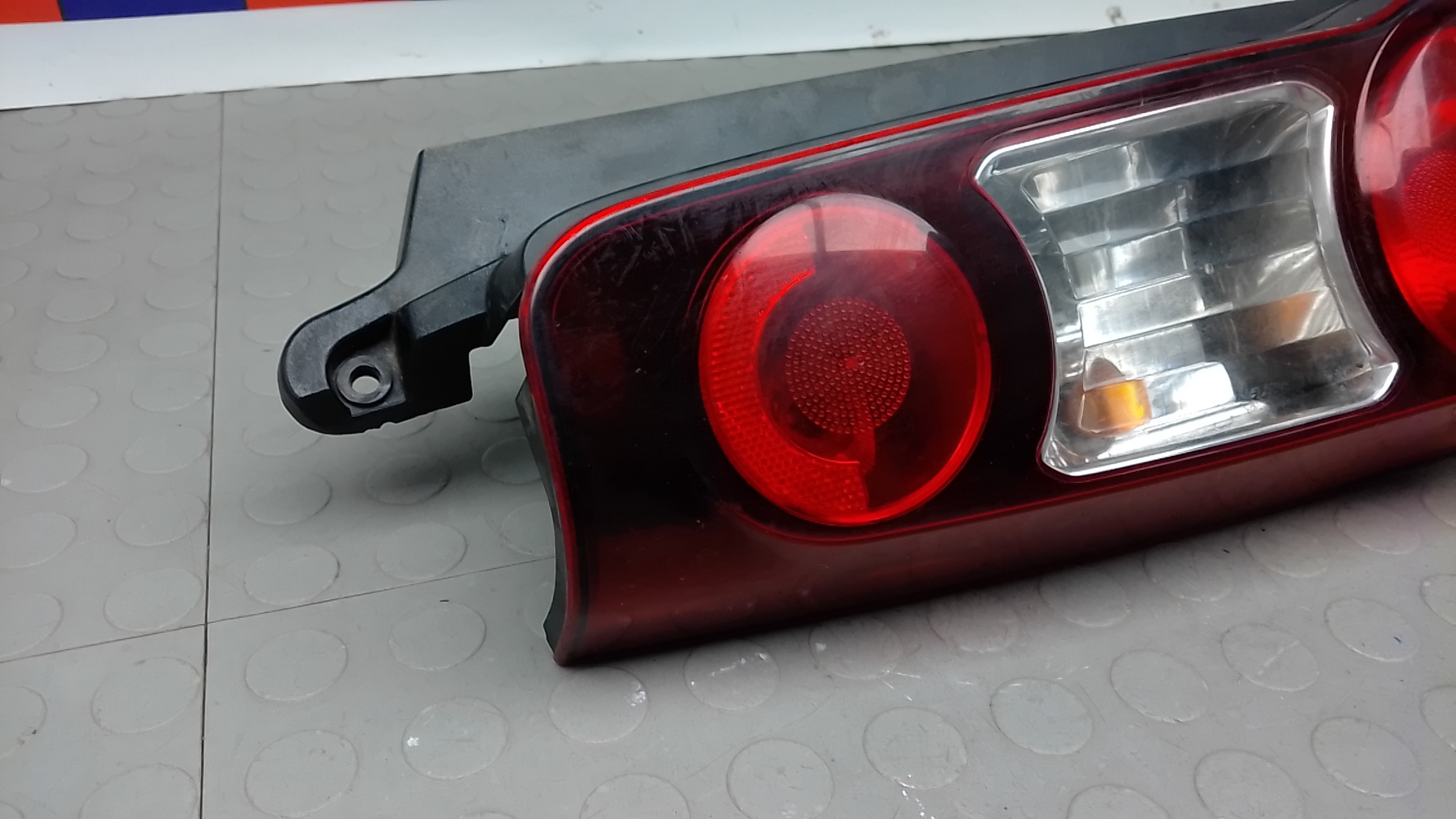 Фонарь задний левый