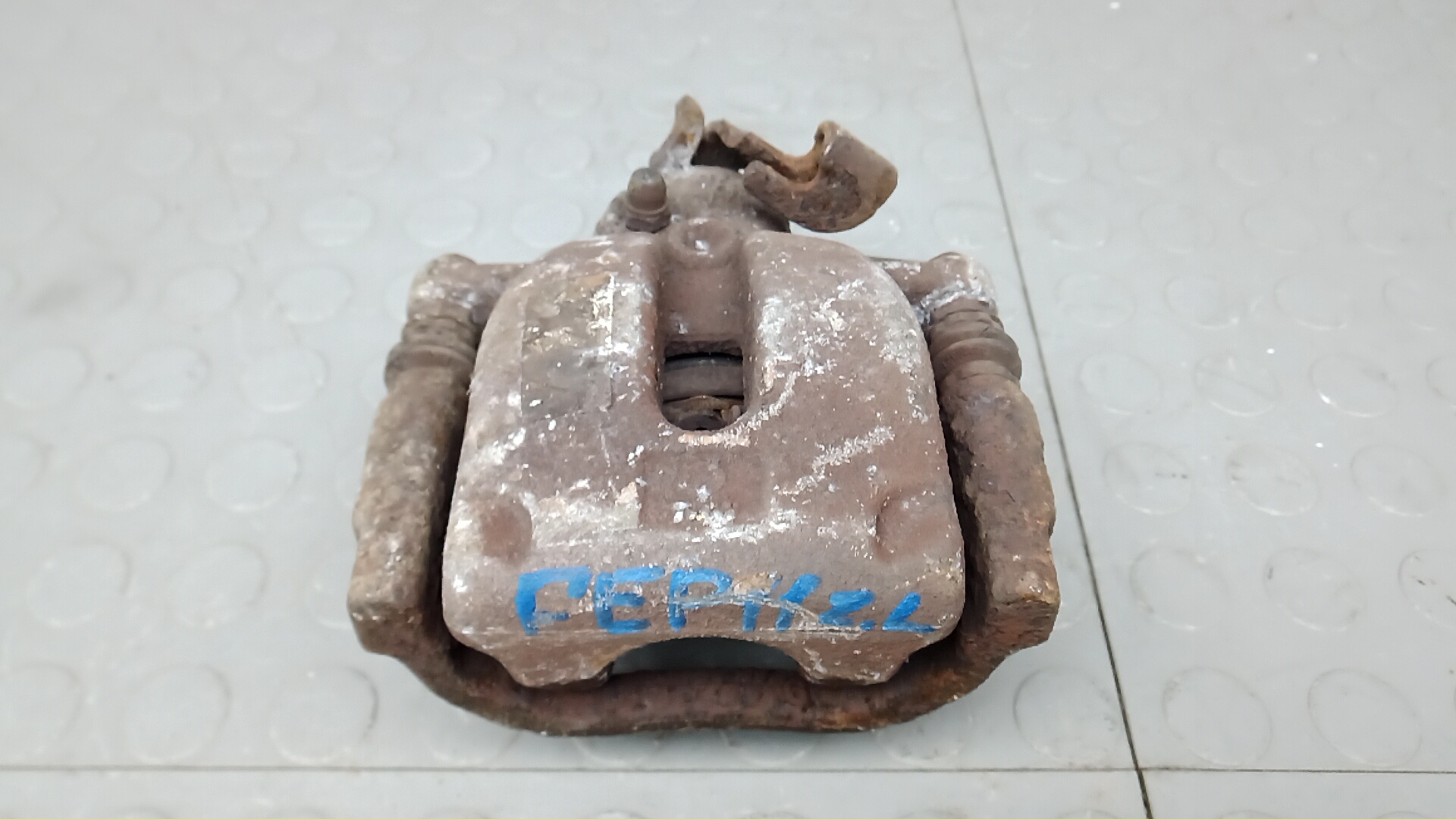 Суппорт задний левый