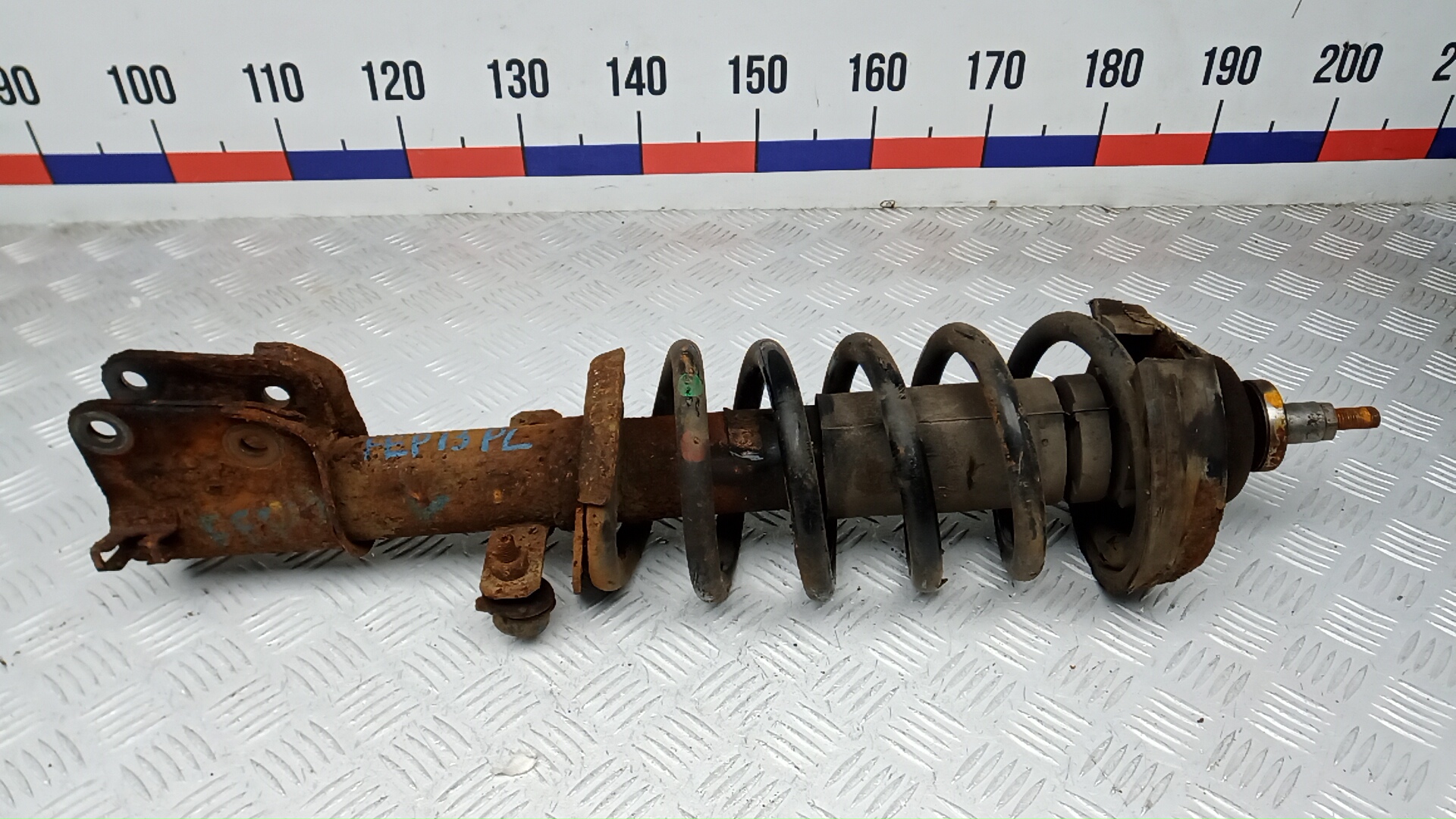 Амортизатор передний левый