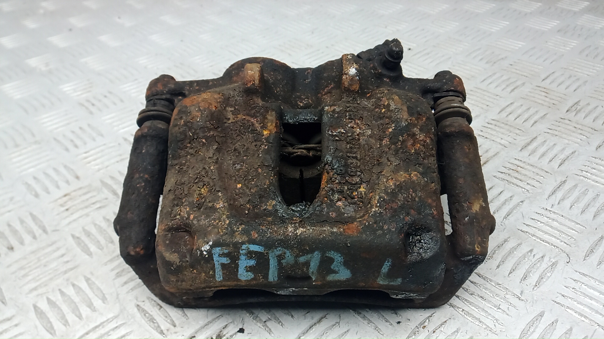 Суппорт передний левый