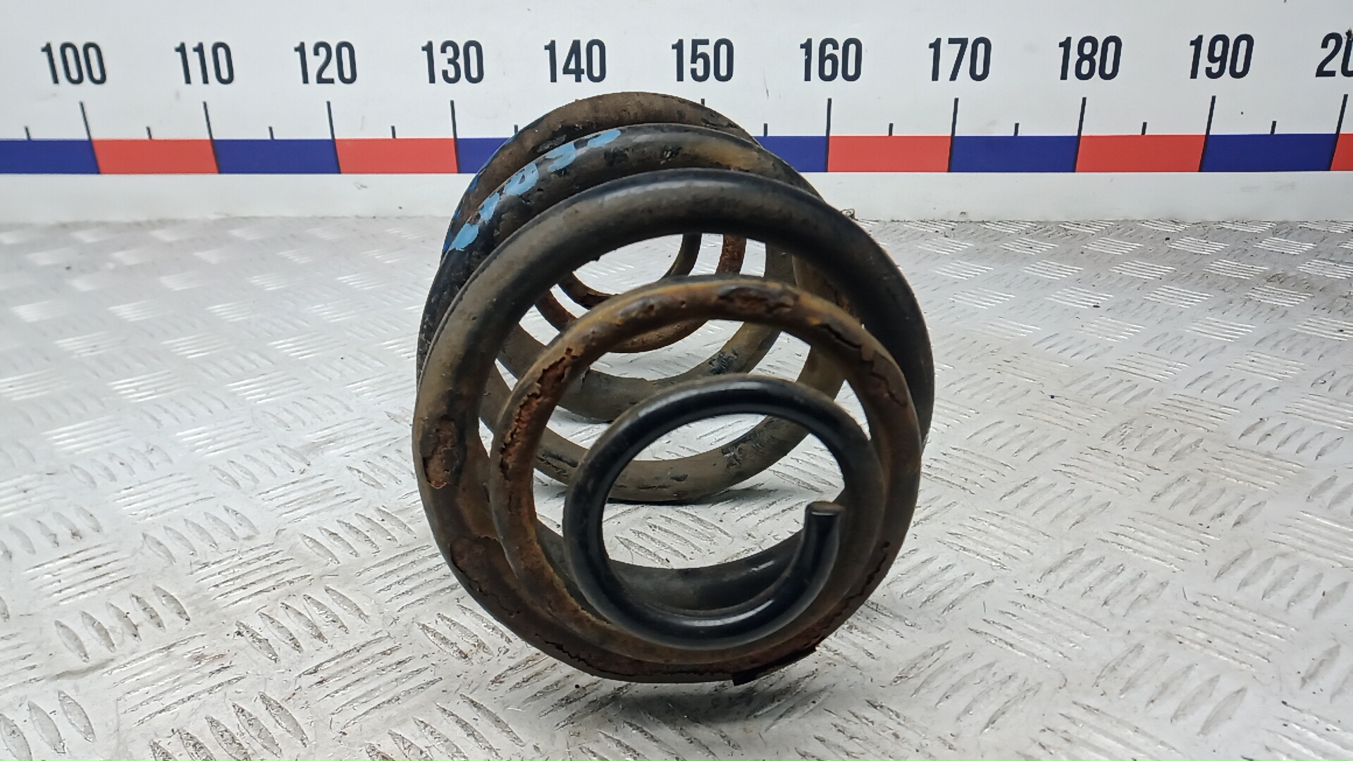 Пружина задняя