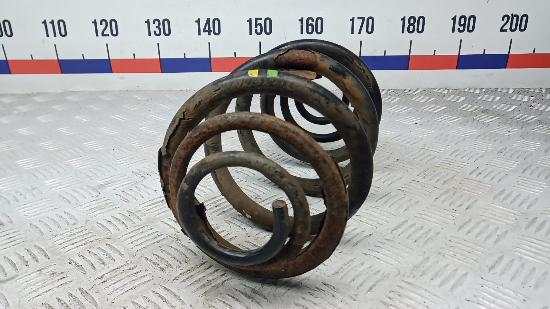 Пружина задняя