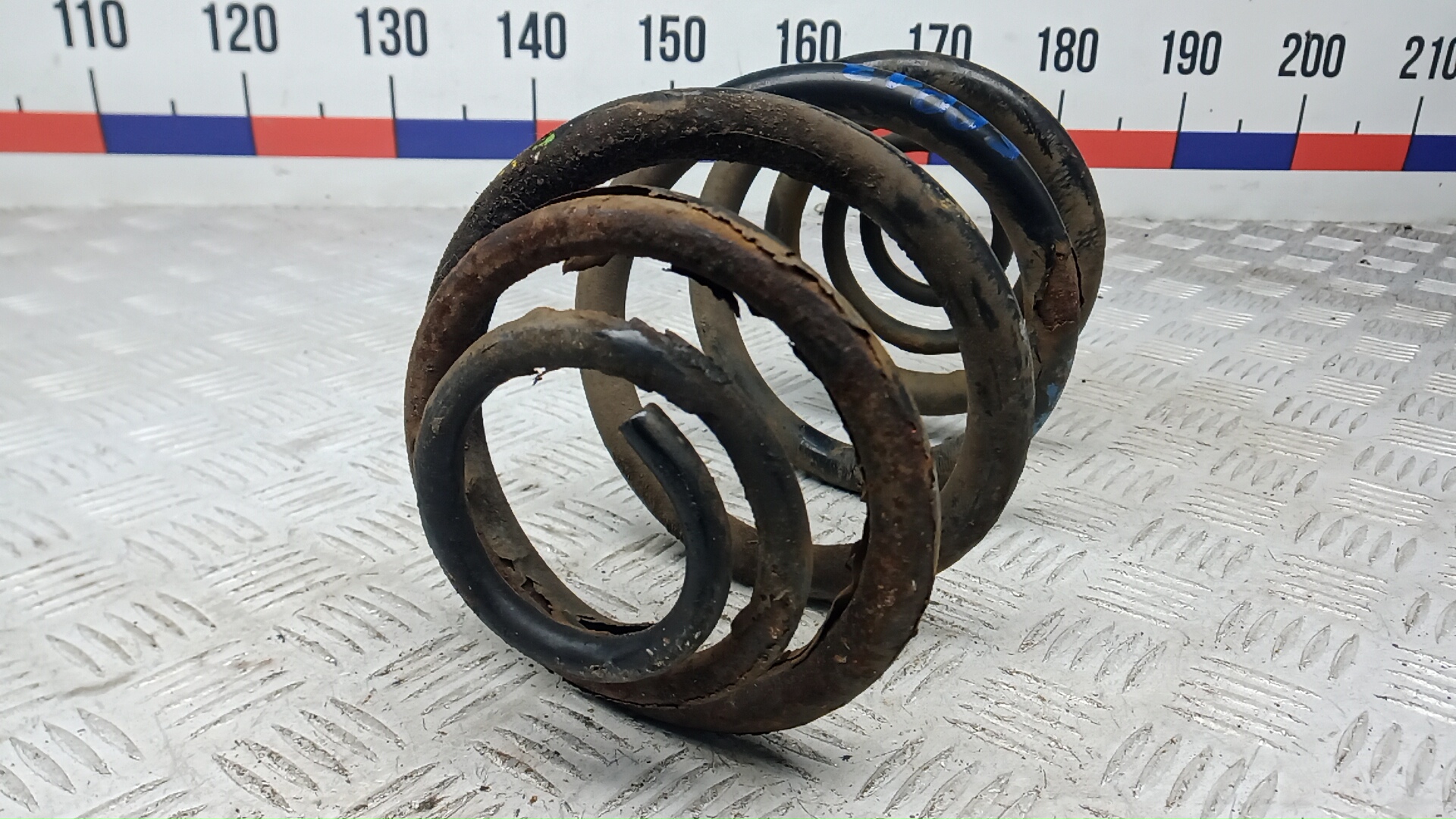 Пружина задняя