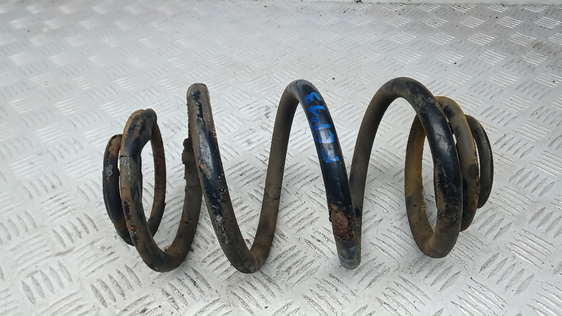 Пружина задняя