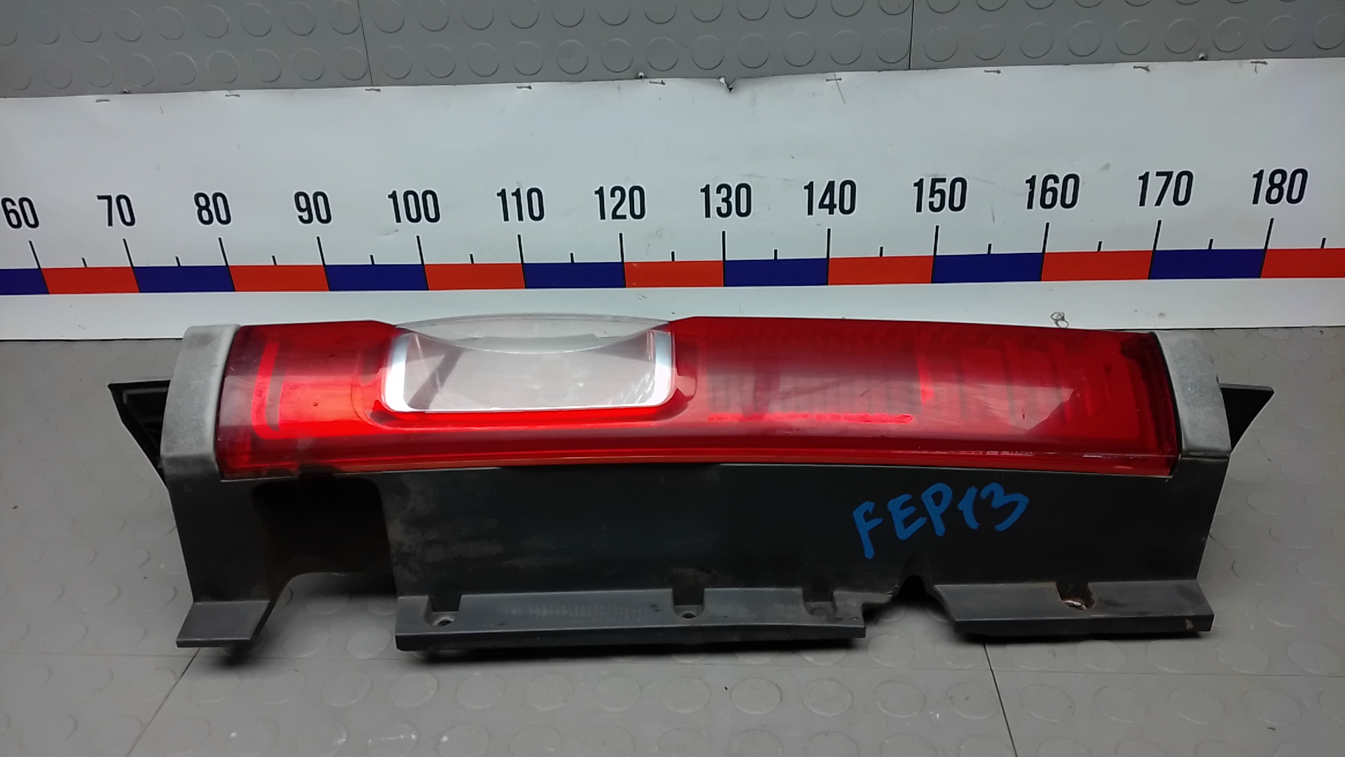 Фонарь задний левый