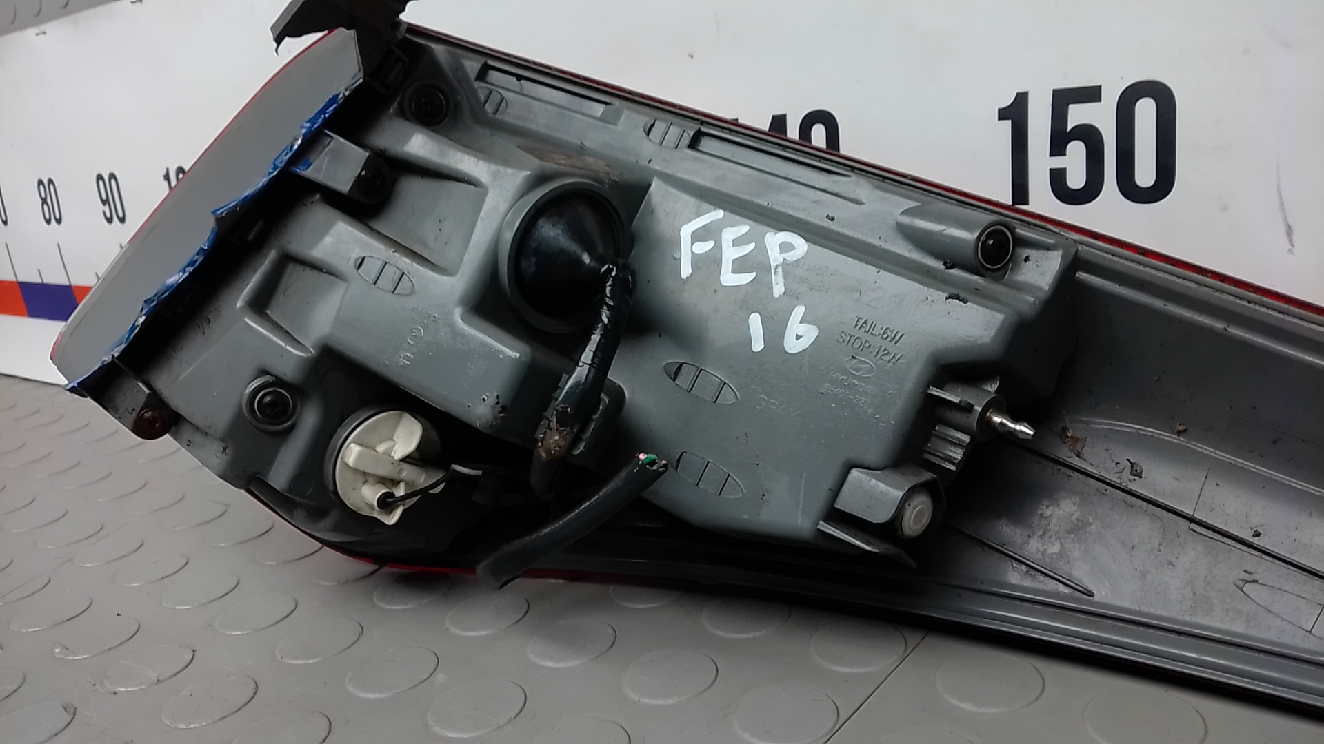 Фонарь задний левый