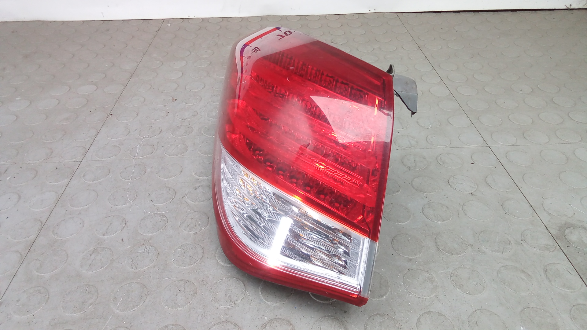 Фонарь задний левый