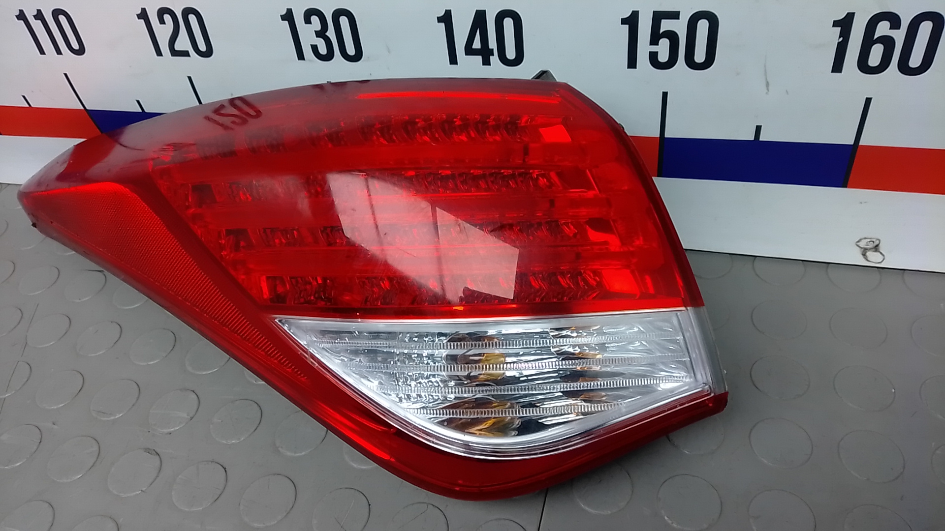 Фонарь задний левый