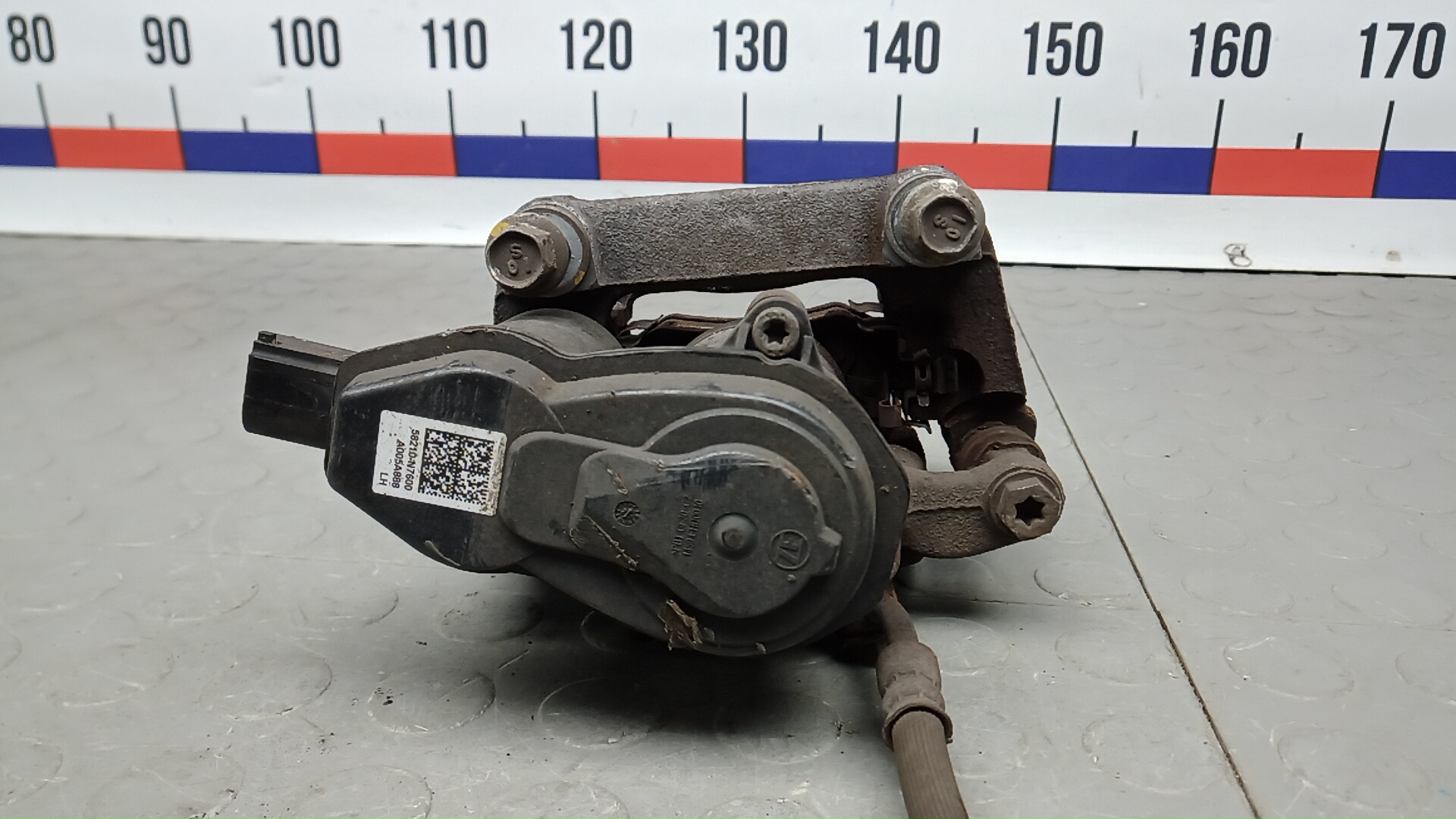 Суппорт задний левый