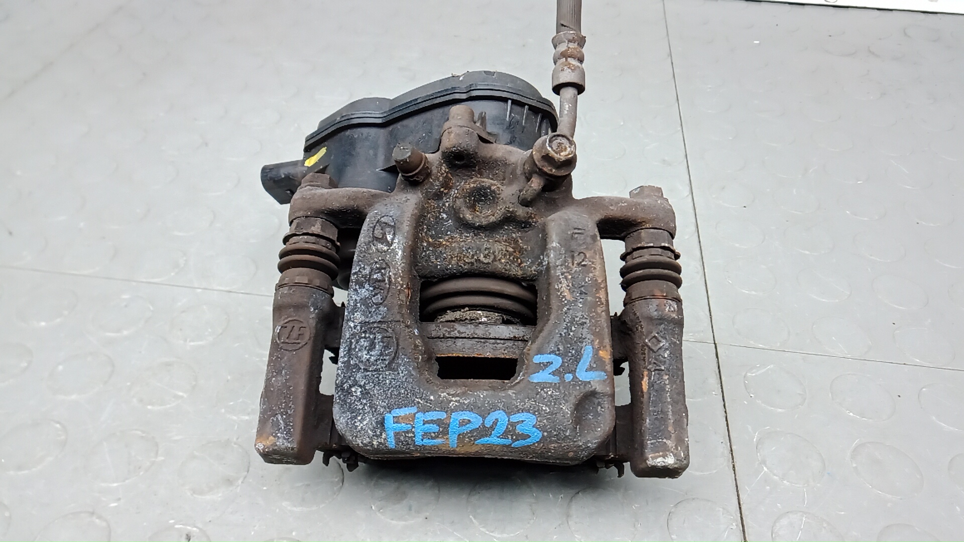 Суппорт задний левый