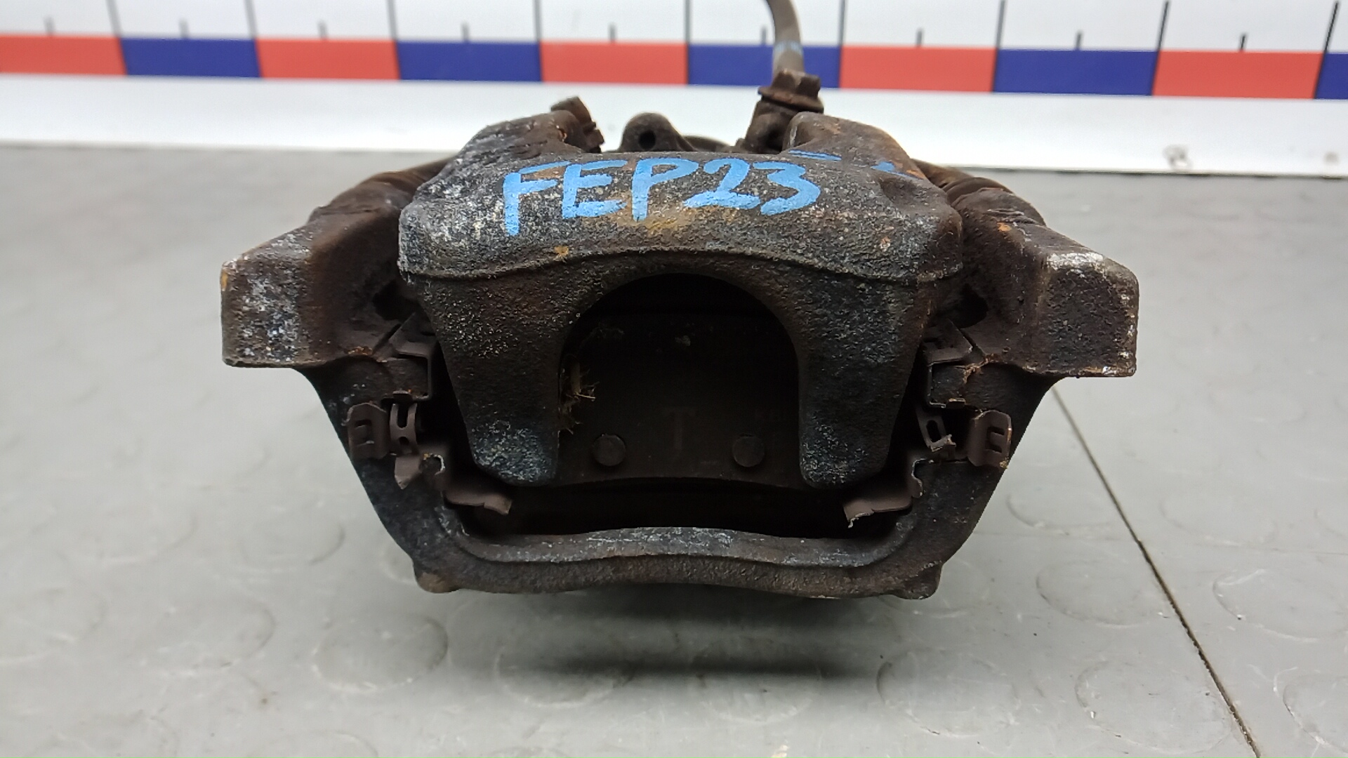 Суппорт задний левый