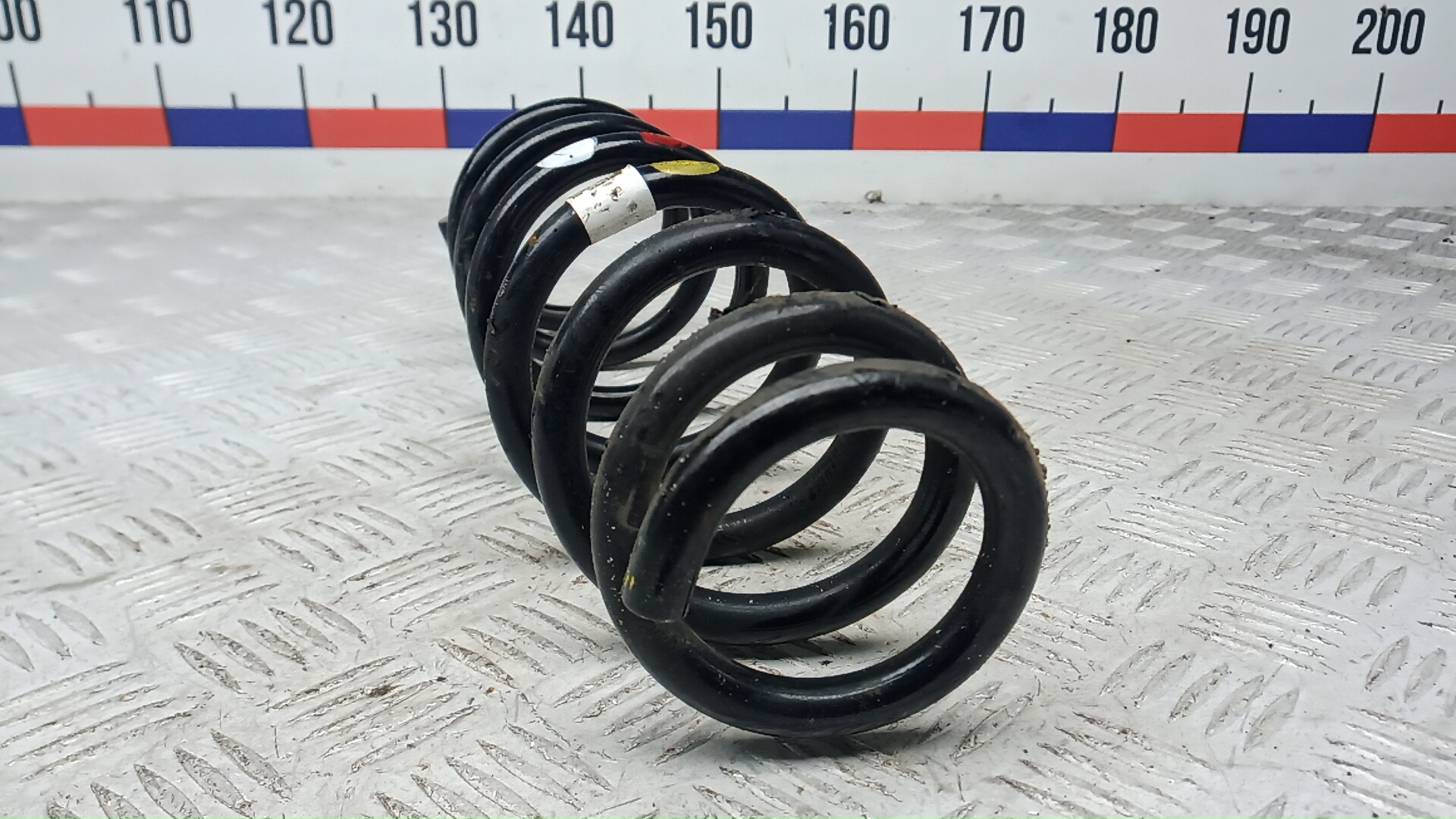 Пружина задняя