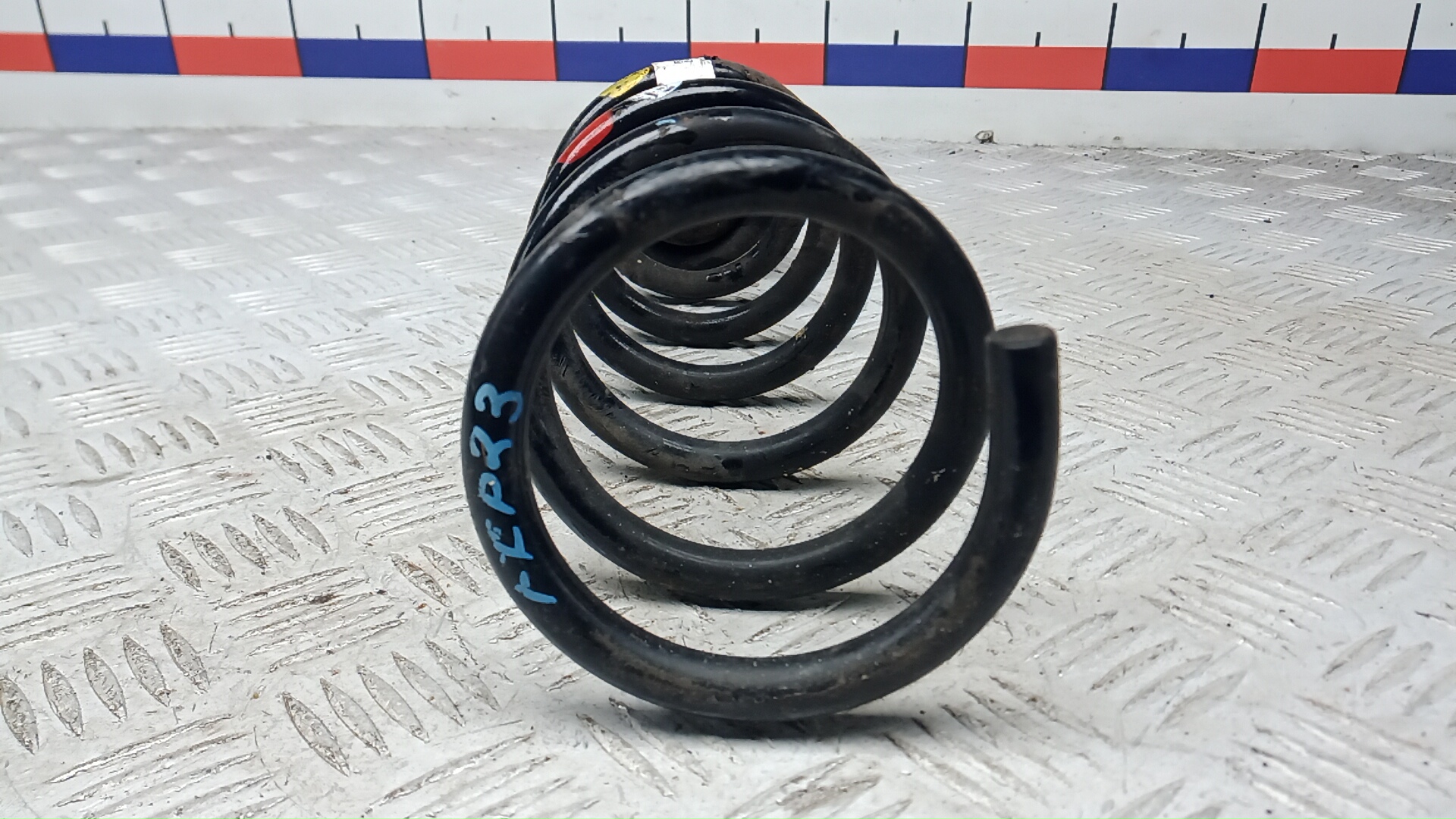 Пружина задняя