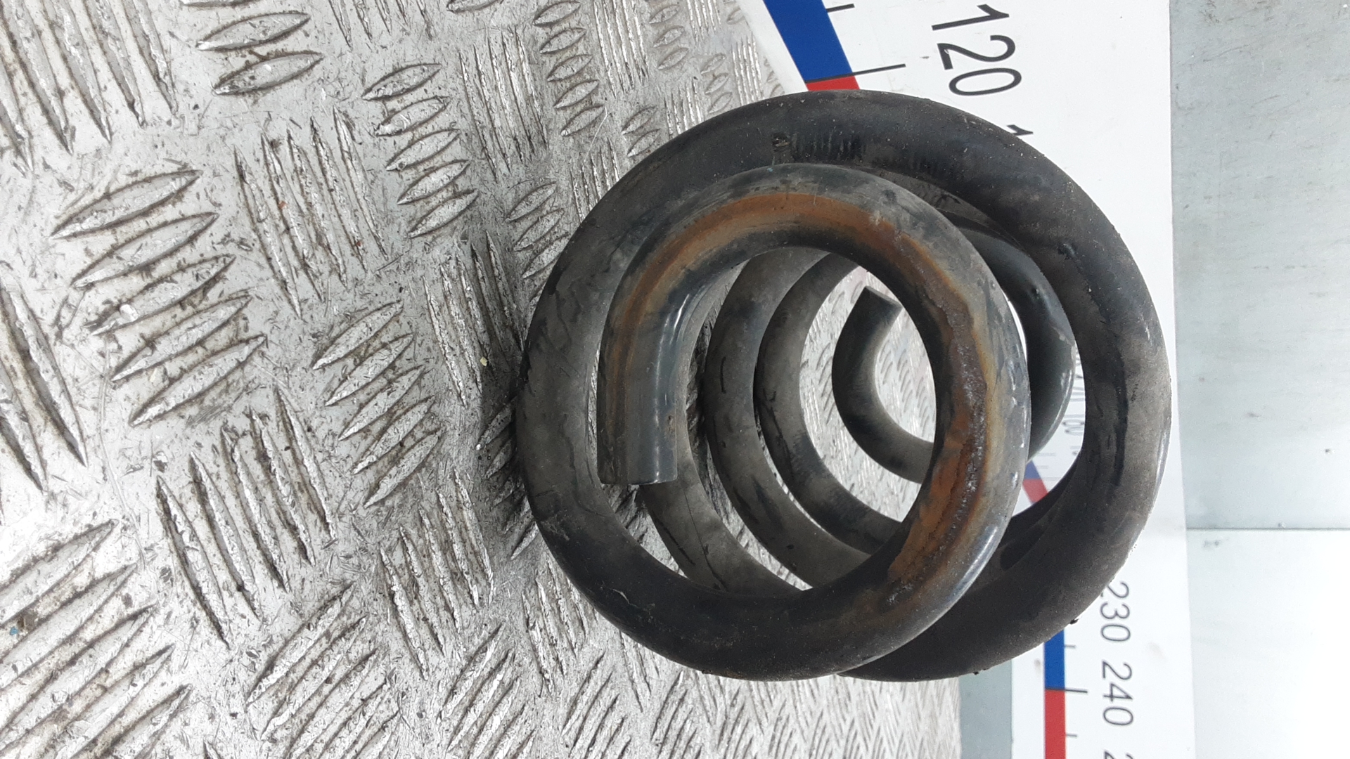 Пружина задняя