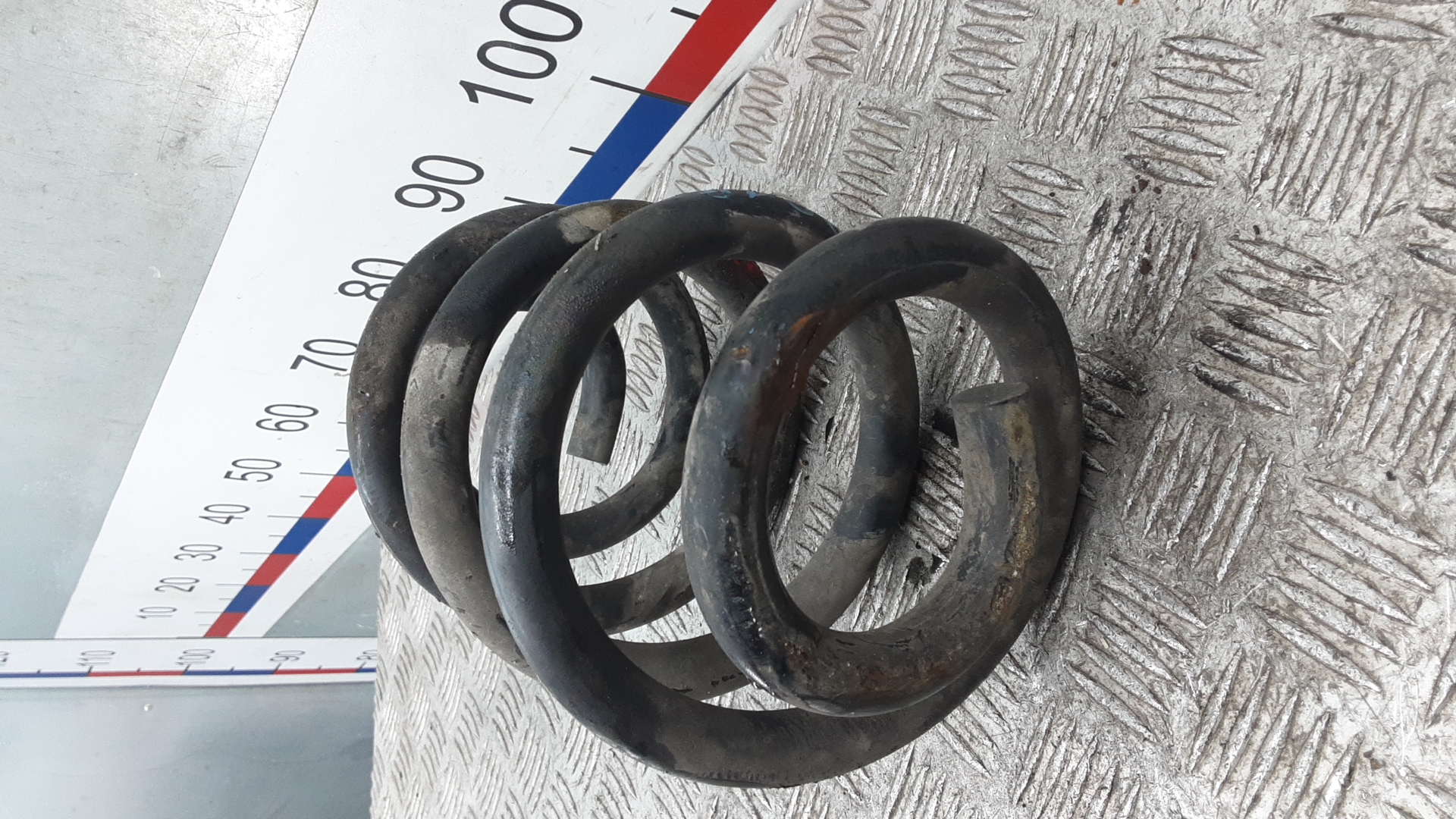 Пружина задняя