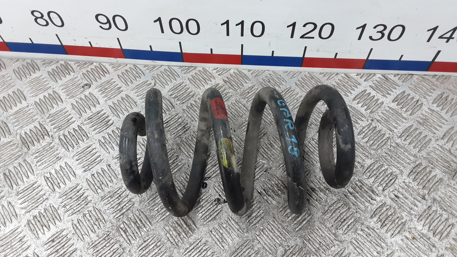 Пружина задняя